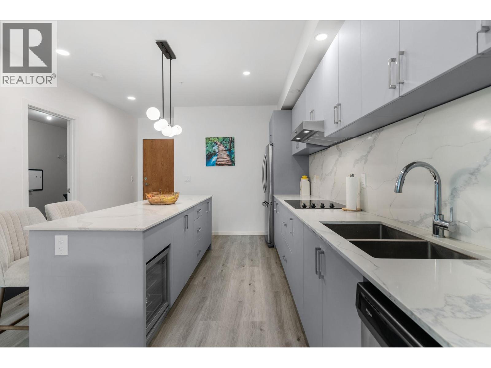 880 Saucier Avenue Unit# 207, Kelowna, BC - Indoor Photo Showing Kitchen With Double Sink With Upgraded Kitchen