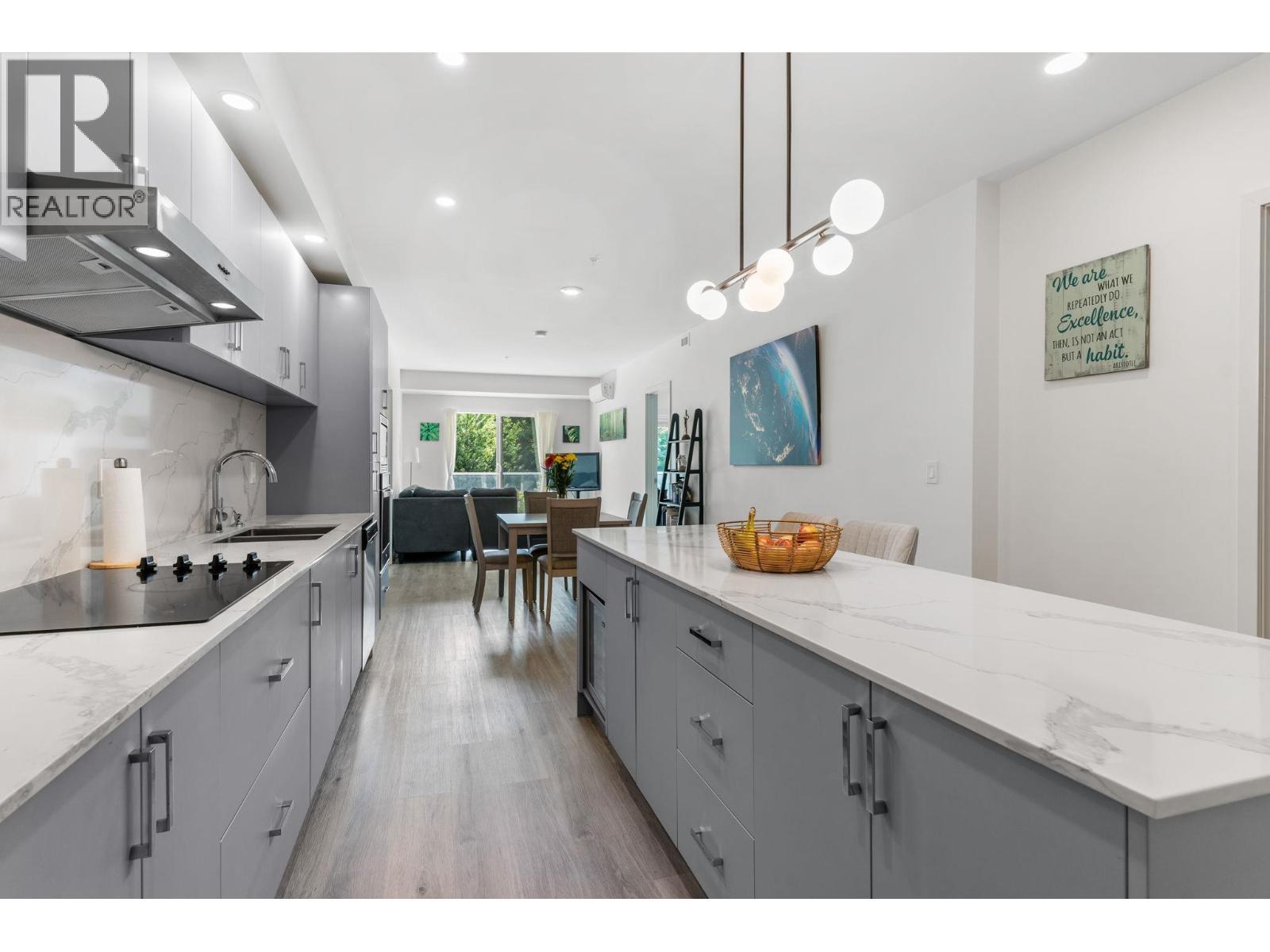 880 Saucier Avenue Unit# 207, Kelowna, BC - Indoor Photo Showing Kitchen With Upgraded Kitchen