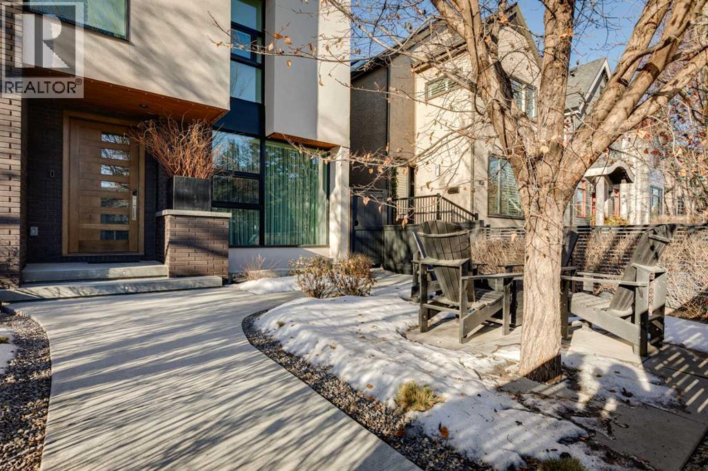 FRONT GARDEN WITH SEATING AREA, ROSES AND PERENNIAL GARDEN - 3813 1A Street Sw, Calgary, AB - Outdoor