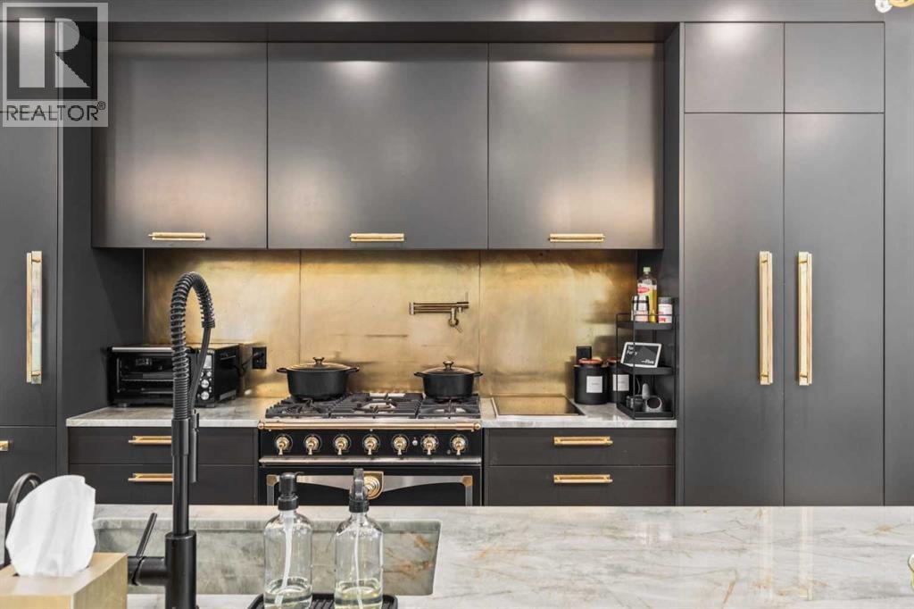 CUSTOM BACKSPLASH WITH POTFILLER, WOLF IINDUCTION BURNER AND CUSTOM QUARTZITE SINK - 3813 1A Street Sw, Calgary, AB - Indoor Photo Showing Other Room