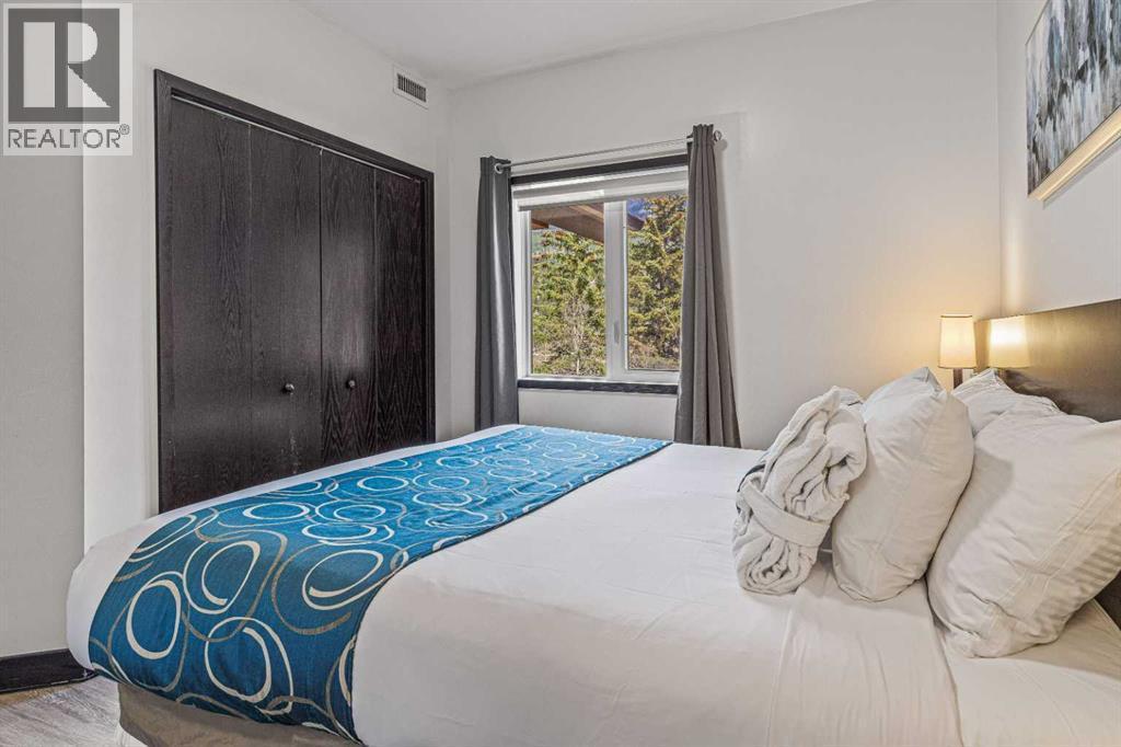 326 Rot. Ef, 901 Mountain Street, Canmore, AB - Indoor Photo Showing Bedroom