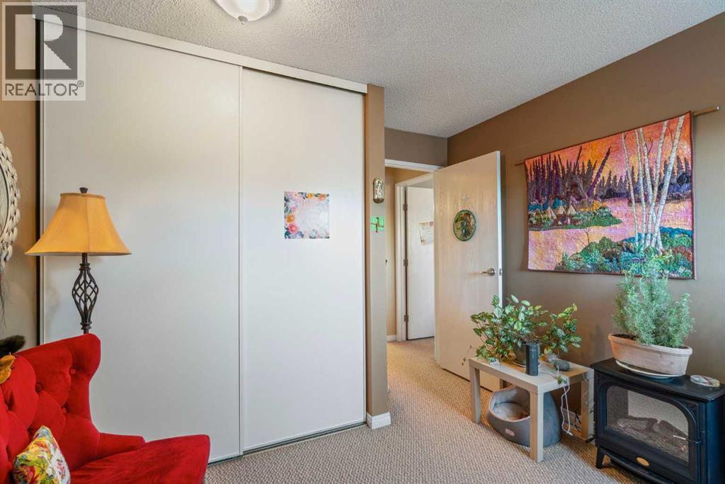 43, 200 Shawnessy Drive Sw, Calgary, AB - Indoor Photo Showing Other Room