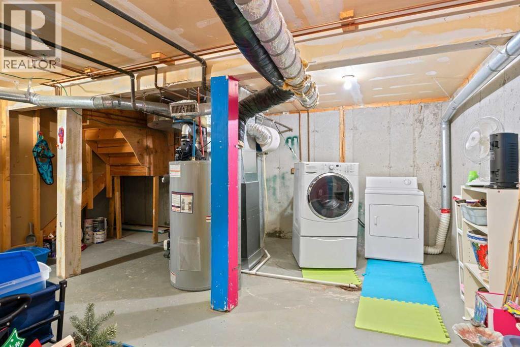 43, 200 Shawnessy Drive Sw, Calgary, AB - Indoor Photo Showing Laundry Room