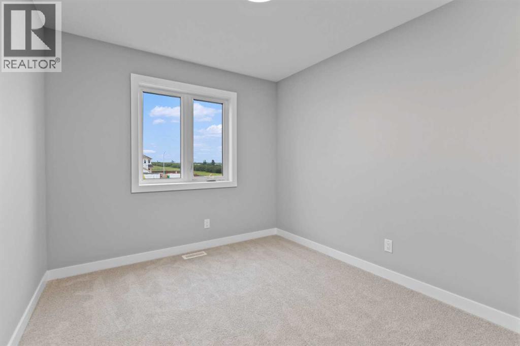 191 Belvedere Crescent Se, Calgary, AB - Indoor Photo Showing Other Room