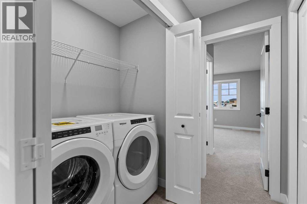 191 Belvedere Crescent Se, Calgary, AB - Indoor Photo Showing Laundry Room
