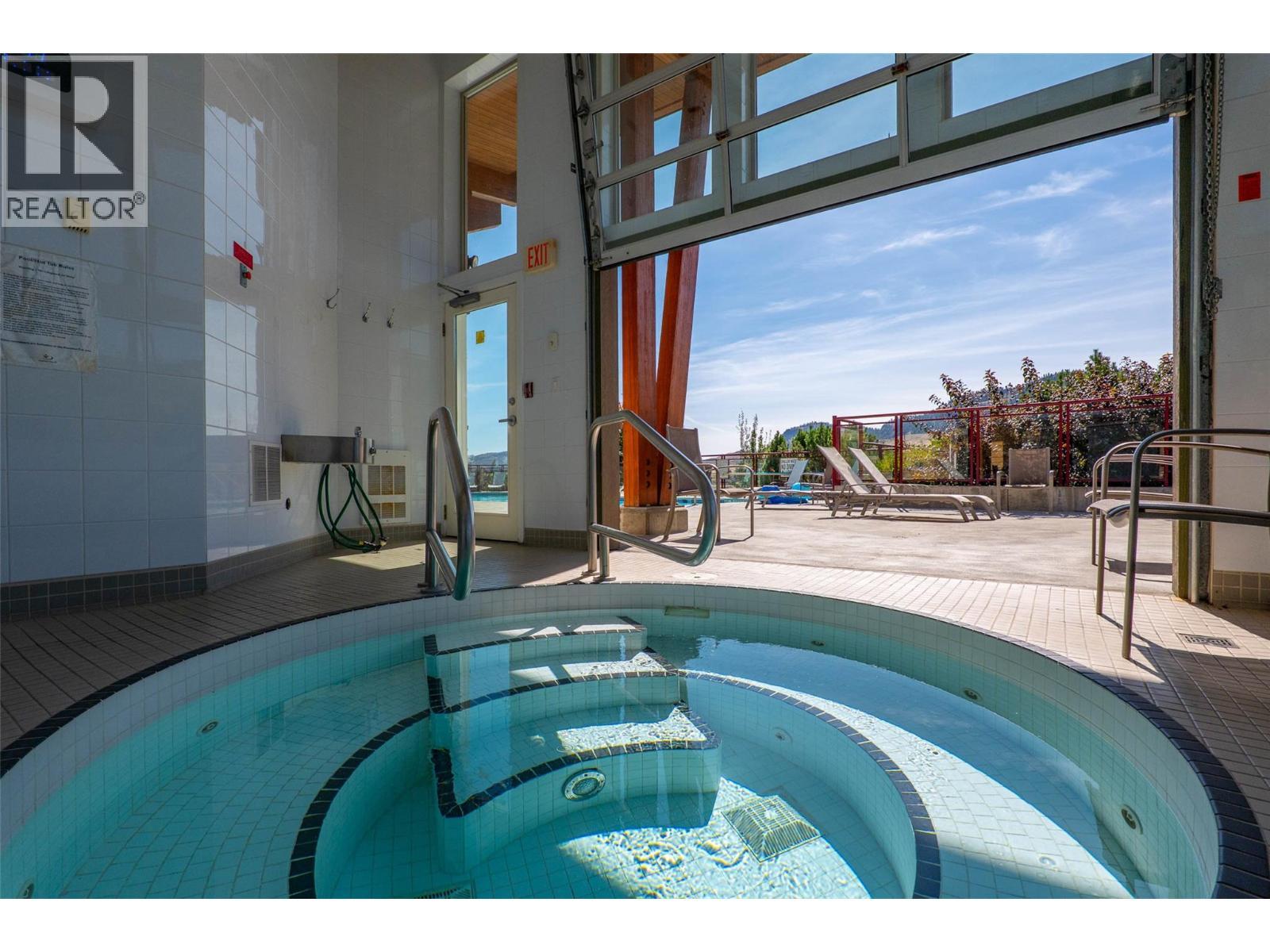 175 Holloway Drive Unit# 49, Kamloops, BC - Indoor Photo Showing Other Room With In Ground Pool