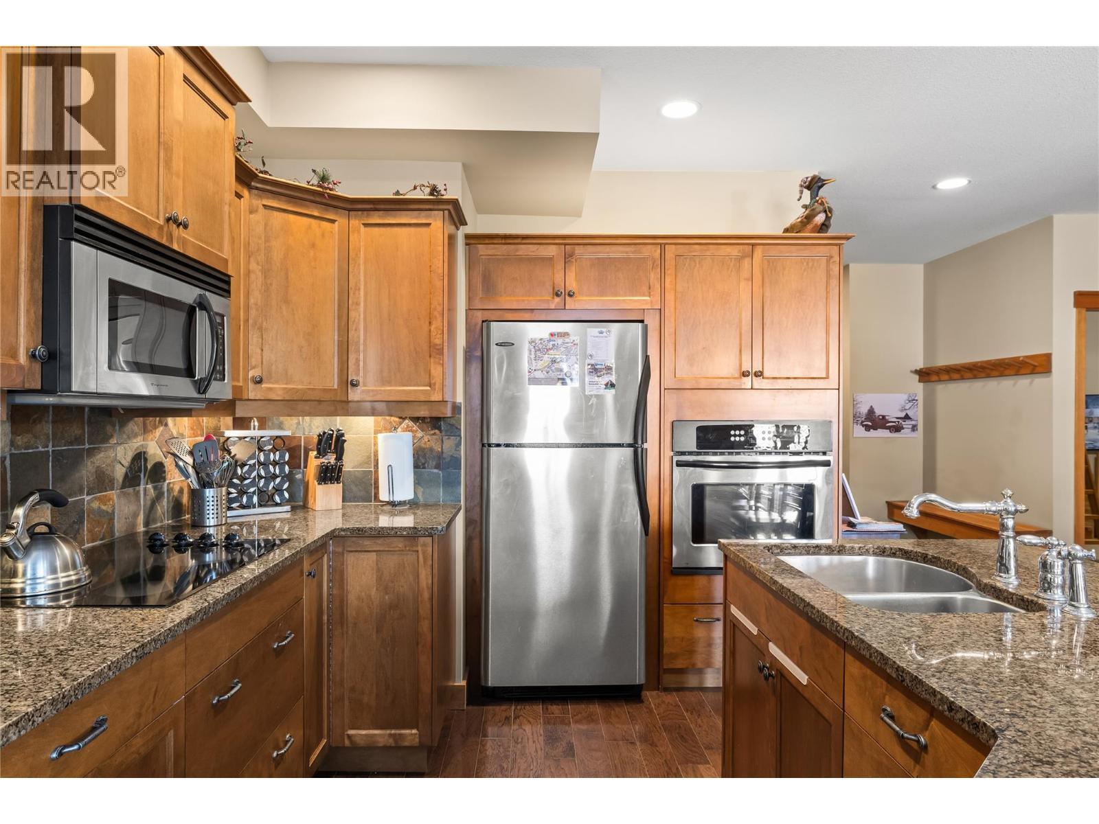 5050 Snowbird Way Unit# 306, Big White, BC - Indoor Photo Showing Kitchen With Stainless Steel Kitchen With Double Sink