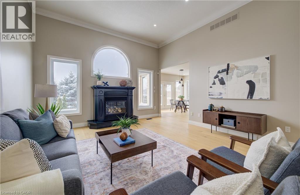 31 Fall Harvest Drive, Kitchener, ON - Indoor Photo Showing Living Room With Fireplace