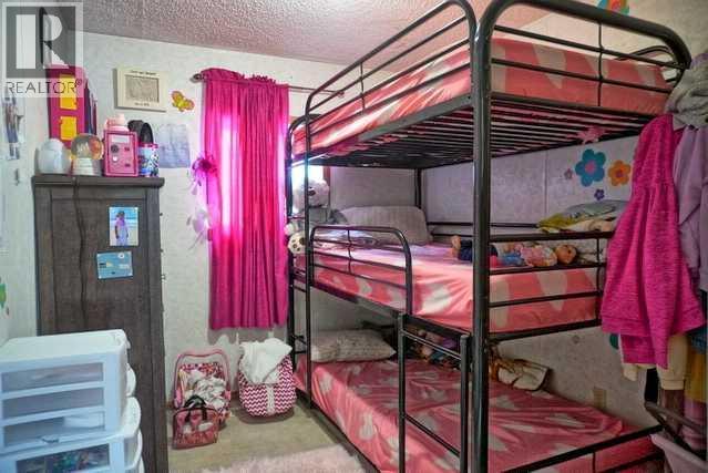15458 Township Road 1064B, Rural Mackenzie County, AB - Indoor Photo Showing Bedroom