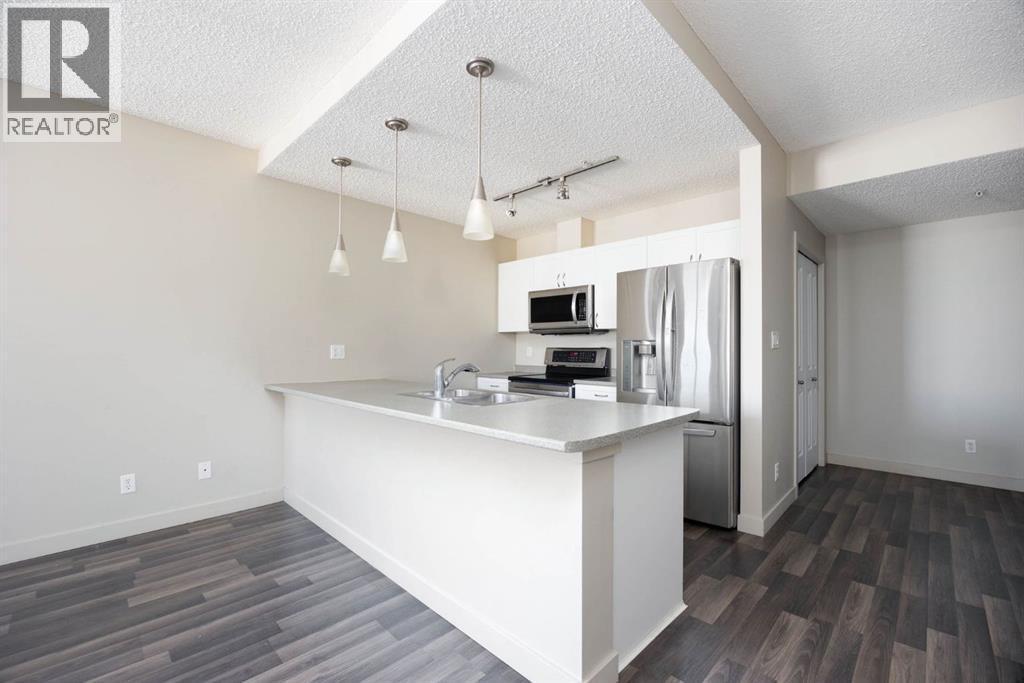 504, 136A Sandpiper Road, Fort Mcmurray, AB - Indoor Photo Showing Kitchen With Double Sink