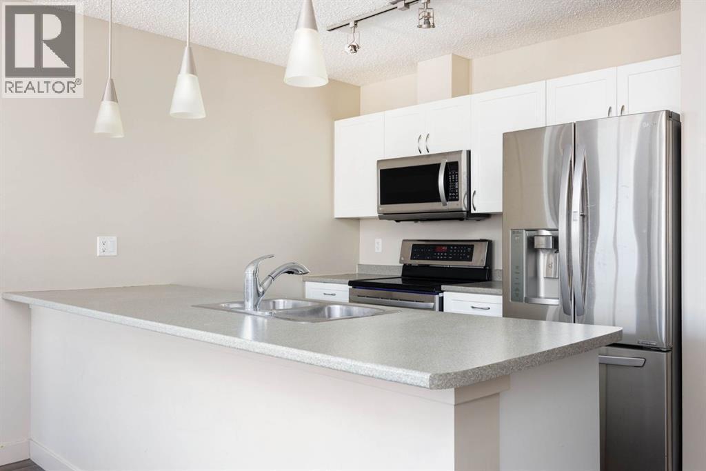 504, 136A Sandpiper Road, Fort Mcmurray, AB - Indoor Photo Showing Kitchen With Double Sink