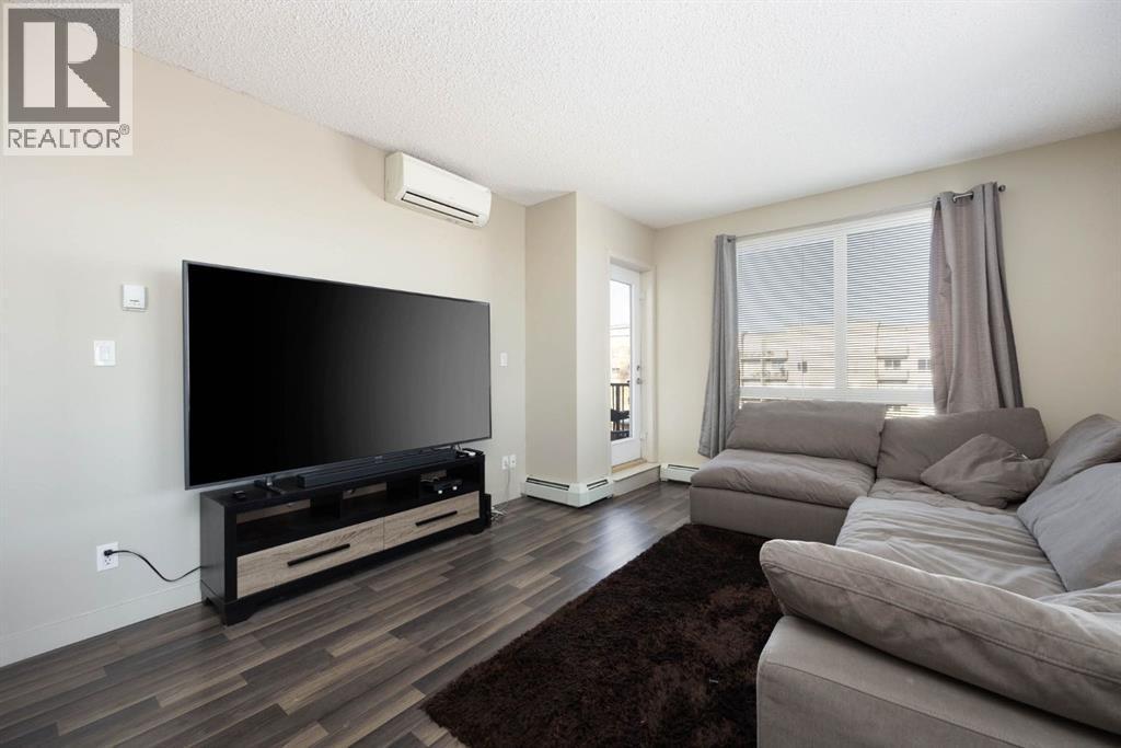 504, 136A Sandpiper Road, Fort Mcmurray, AB - Indoor Photo Showing Living Room