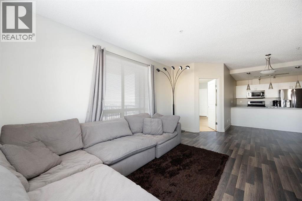 504, 136A Sandpiper Road, Fort Mcmurray, AB - Indoor Photo Showing Living Room