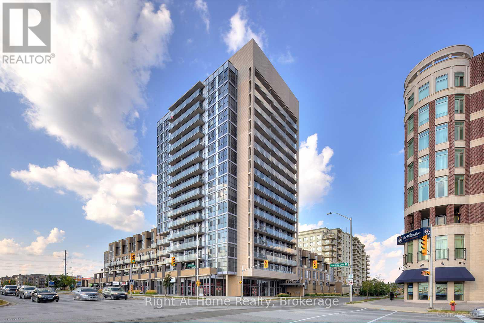 1506 - 1940 Ironstone Drive, Burlington (Uptown), ON - Outdoor With Balcony With Facade