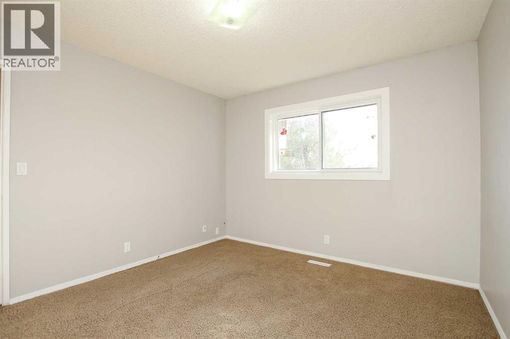 Primary Bedroom - 69 Erickson Drive, Red Deer, AB - Indoor Photo Showing Other Room