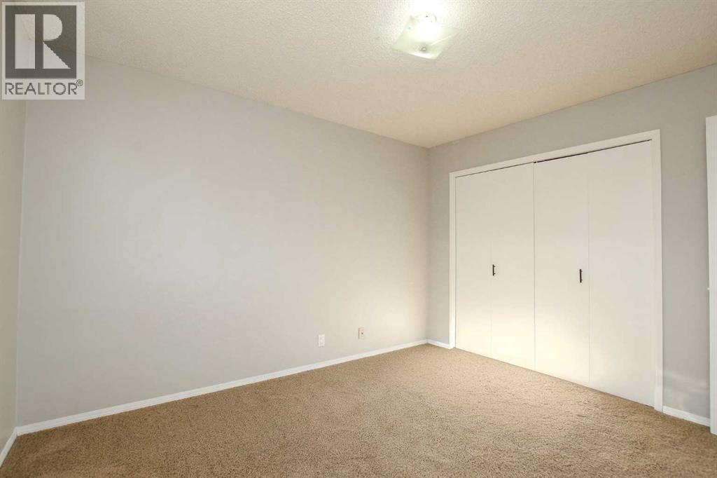 Primary Bedroom - 69 Erickson Drive, Red Deer, AB - Indoor Photo Showing Other Room