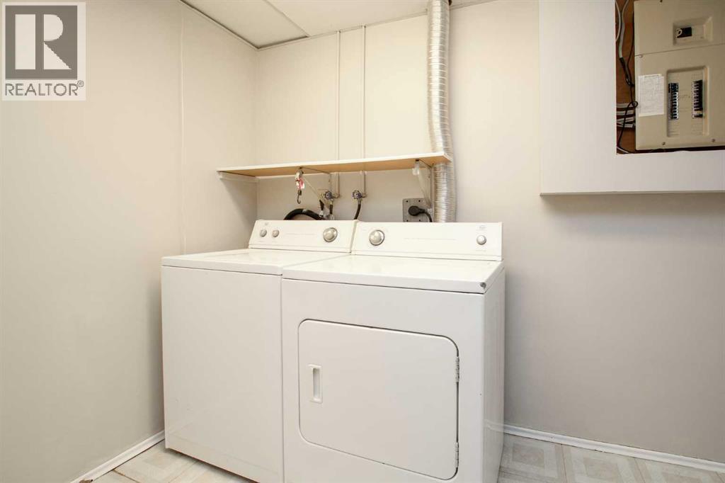 Laundry - 69 Erickson Drive, Red Deer, AB - Indoor Photo Showing Laundry Room