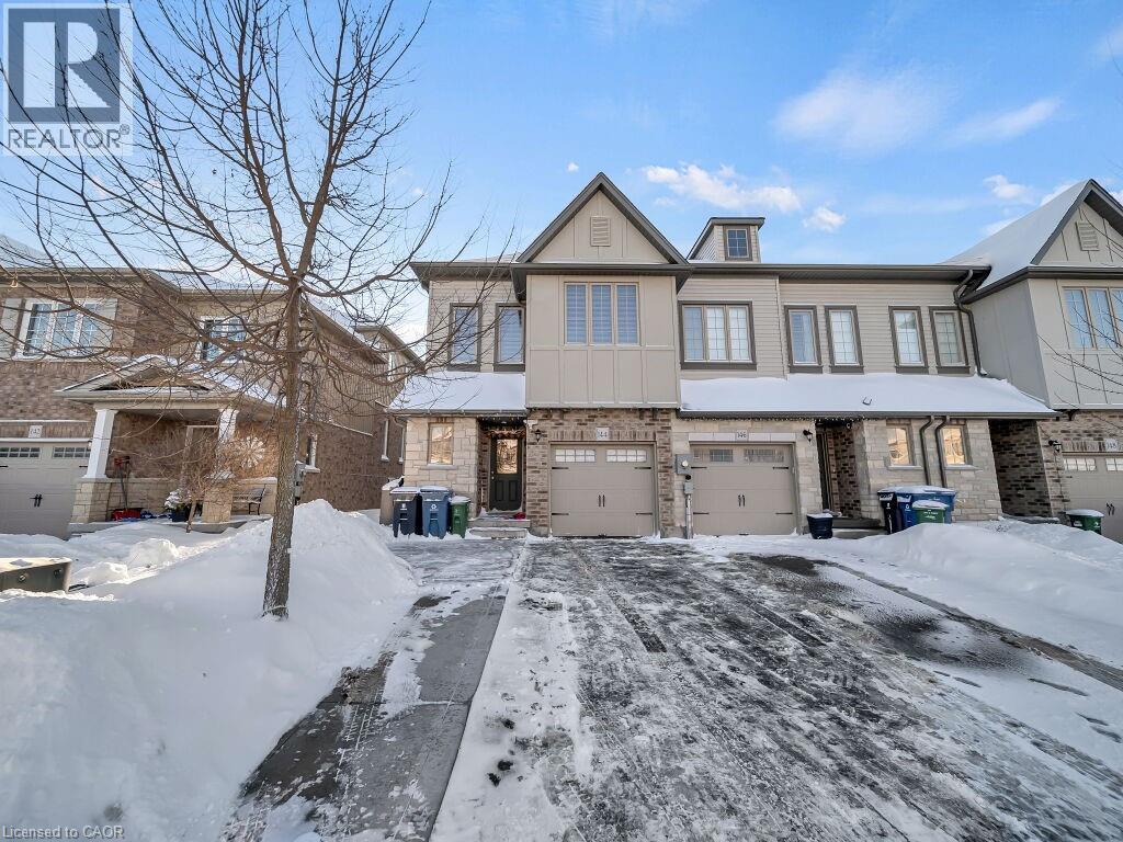 View of front facade featuring a garage - 144 Summit Ridge Drive, Guelph, ON - Outdoor With Facade