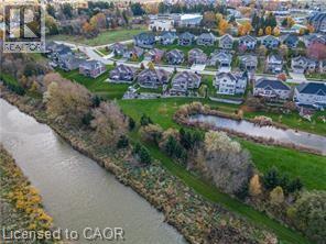 View of property location with a nearby body of water and nearby suburban area - 158 River Run Road, Drayton, ON - Outdoor With Body Of Water With View