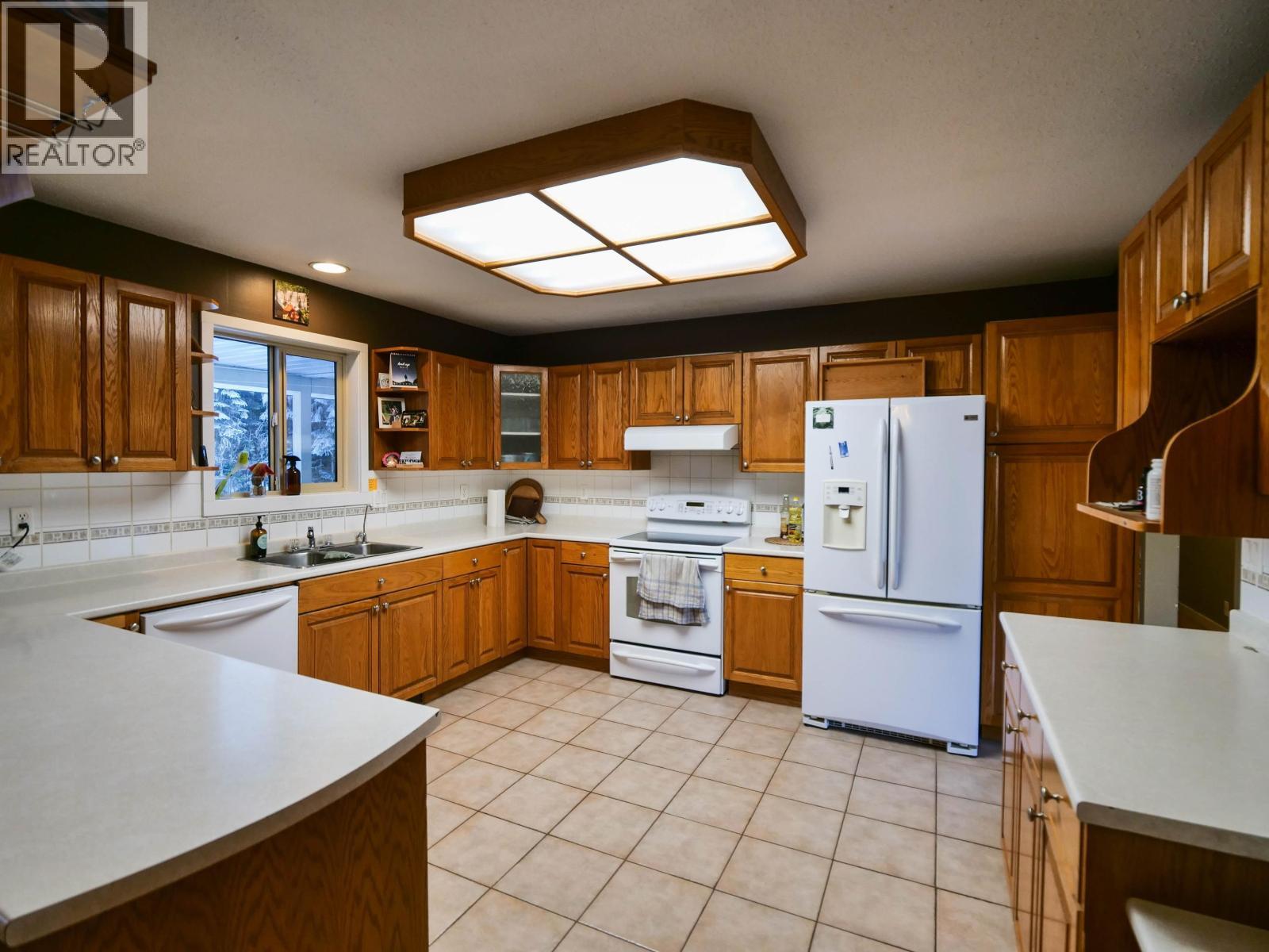 1282 Omega Road, Quesnel, BC - Indoor Photo Showing Kitchen With Double Sink