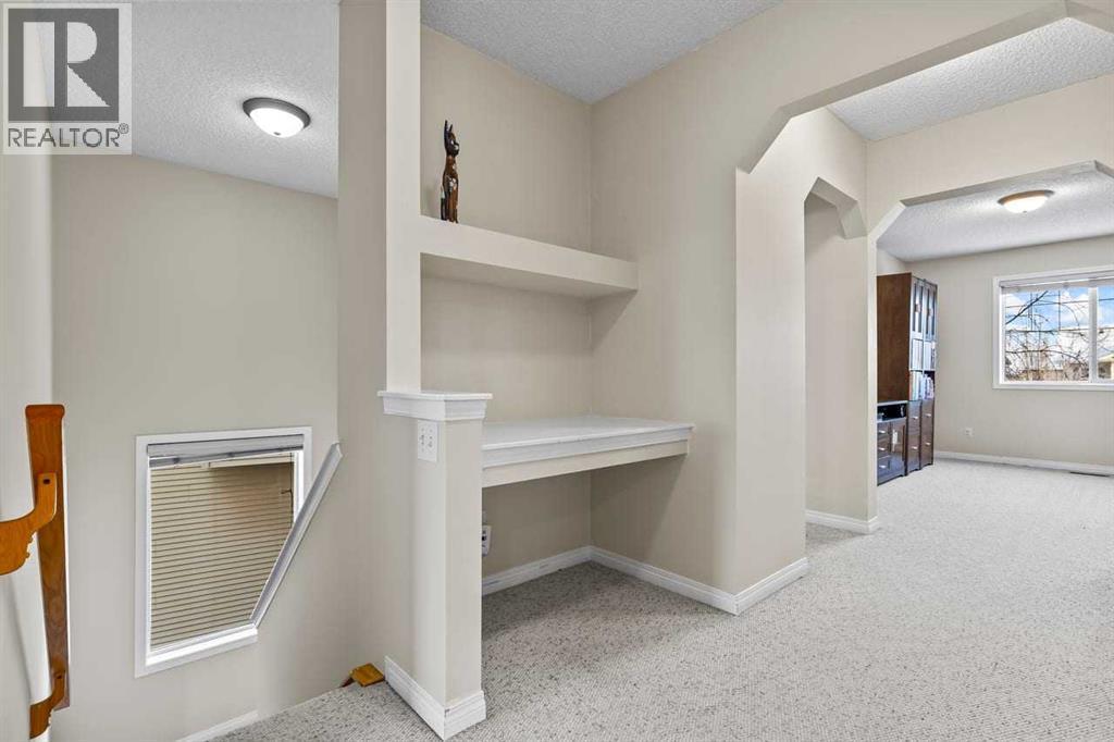 176 Cougar Ridge Circle Sw, Calgary, AB - Indoor Photo Showing Other Room