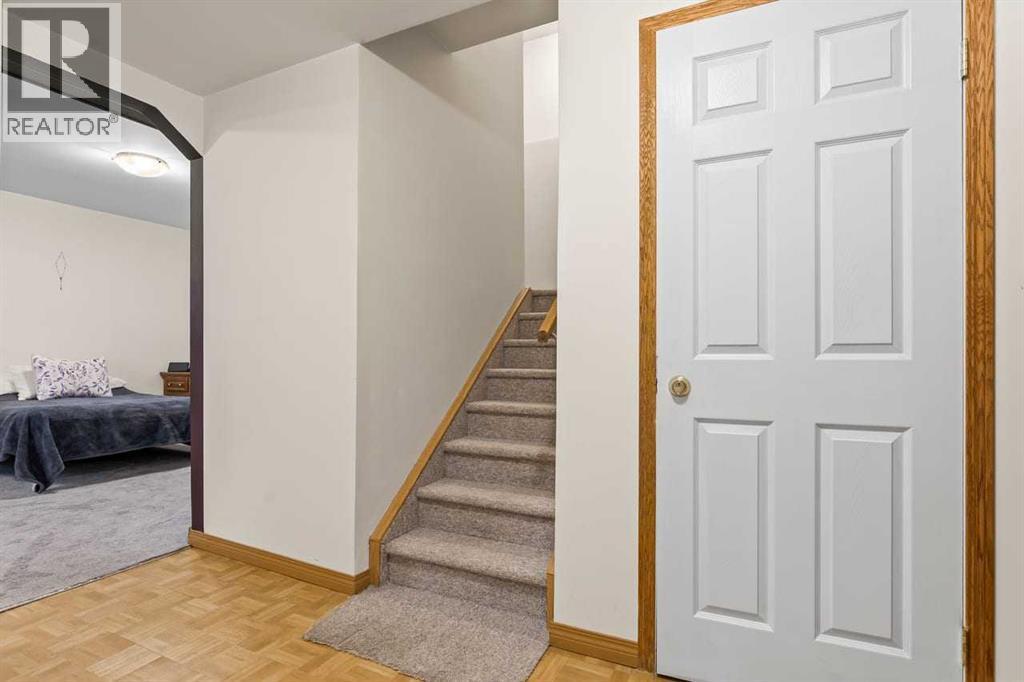 176 Cougar Ridge Circle Sw, Calgary, AB - Indoor Photo Showing Other Room