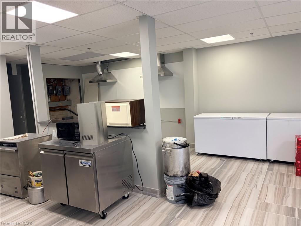 Laundry area featuring a paneled ceiling - 354 King Street N Unit# 3, Waterloo, ON