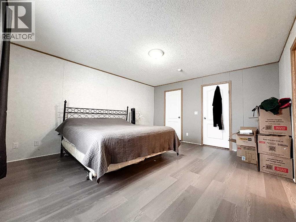 9009 90 Avenue, Grande Prairie, AB - Indoor Photo Showing Bedroom