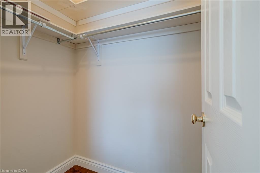Spacious closet featuring wood finished floors - 15 Claudette Gate, Hamilton, ON - Indoor With Storage