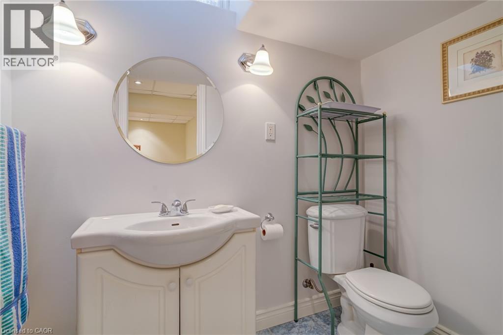 Half bath featuring vanity and toilet - 15 Claudette Gate, Hamilton, ON - Indoor Photo Showing Bathroom