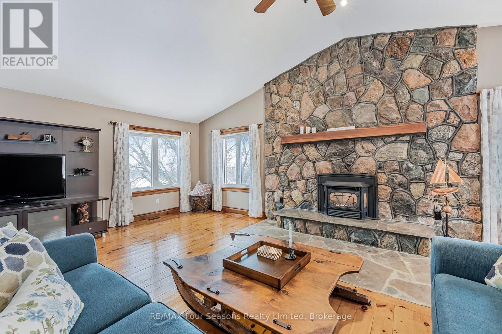 Upper Floor - Family Room with Cozy Fireplace - 3 Sydenham Trail E, Clearview, ON - Indoor Photo Showing Living Room With Fireplace