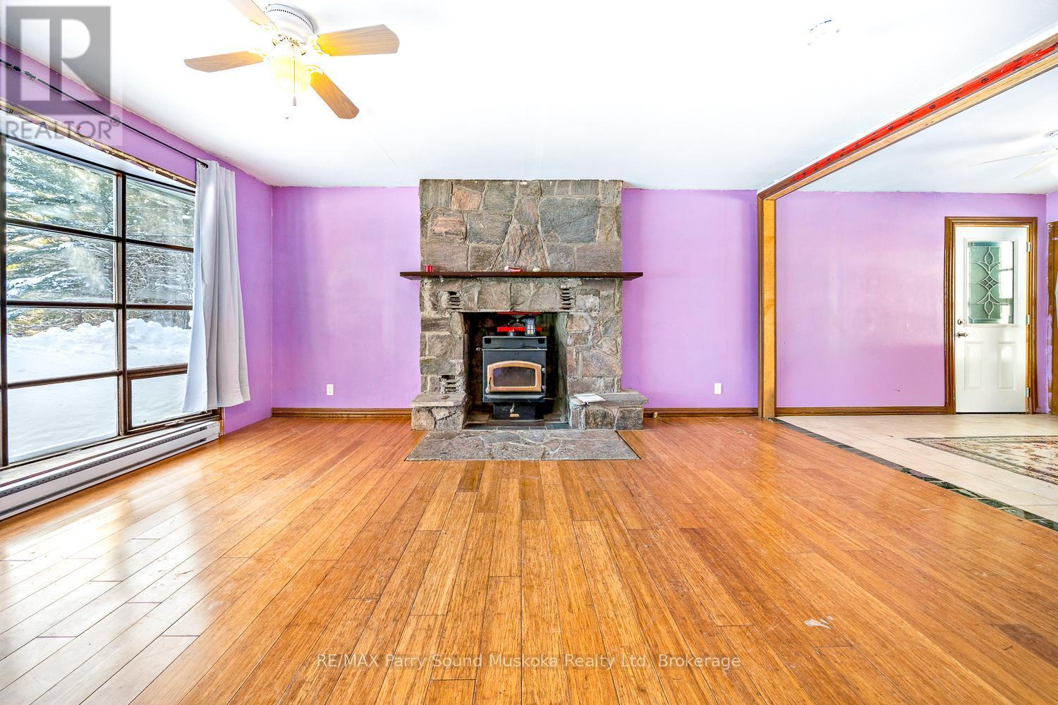 1 Old Carling Road, Carling, ON - Indoor With Fireplace