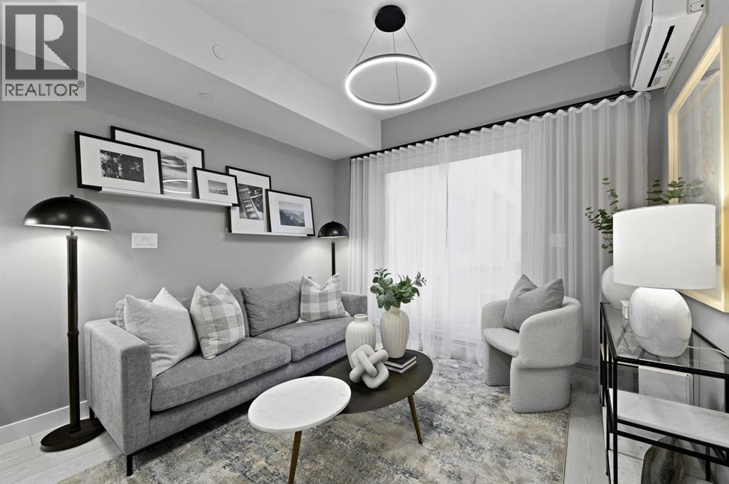 213, 310 15 Avenue Sw, Calgary, AB - Indoor Photo Showing Living Room