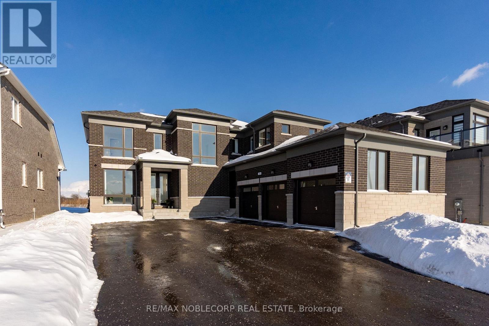 36 Felhazi Trail, Essa, ON - Outdoor With Facade