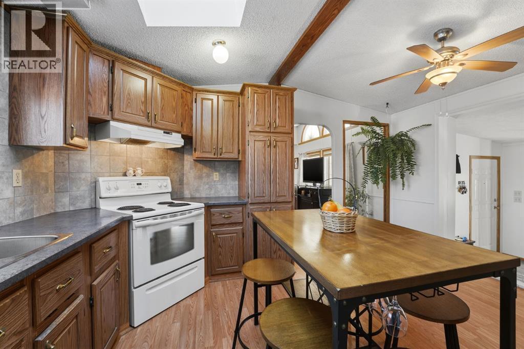 #47, 33009 Range Road 55, Rural Mountain View County, AB - Indoor Photo Showing Kitchen