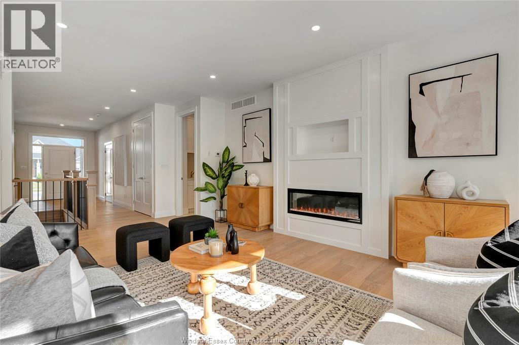 76 Belleview Drive, Kingsville, ON - Indoor Photo Showing Living Room With Fireplace