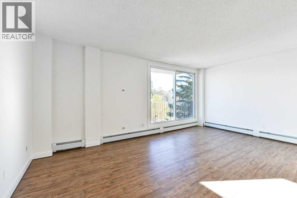 204, 2220 16A Street Sw, Calgary, AB - Indoor Photo Showing Other Room