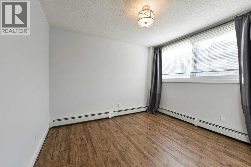 204, 2220 16A Street Sw, Calgary, AB - Indoor Photo Showing Other Room