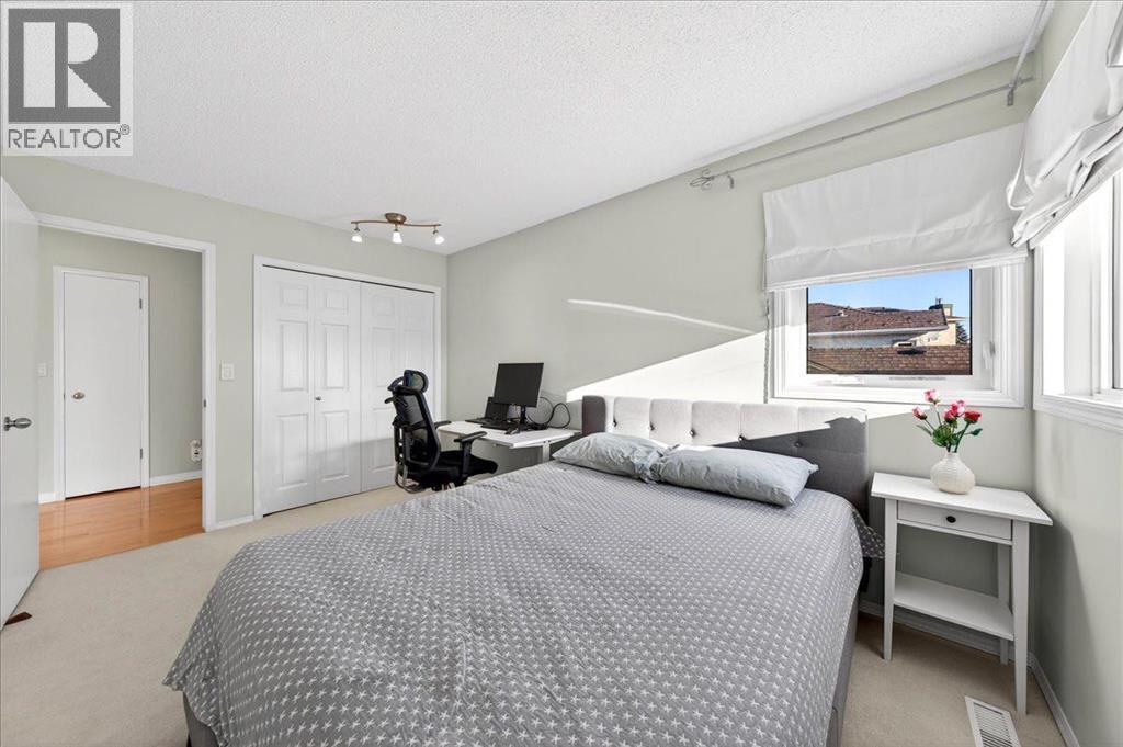 2nd bedroom - 137 Woodbrook Road Sw, Calgary, AB - Indoor Photo Showing Bedroom