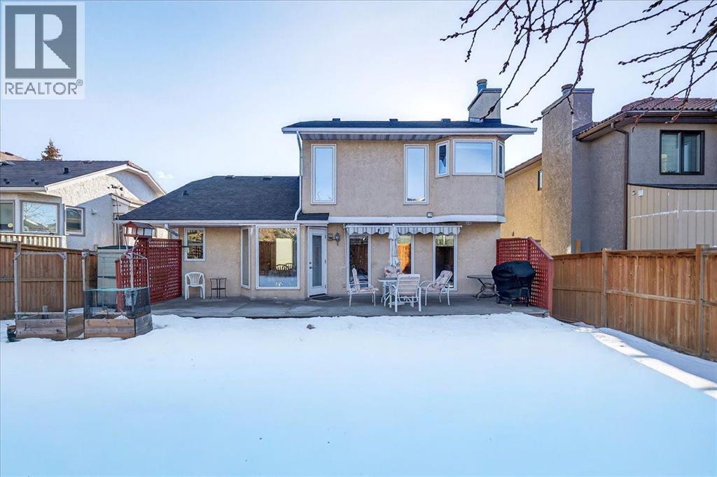 back - 137 Woodbrook Road Sw, Calgary, AB - Outdoor With Deck Patio Veranda
