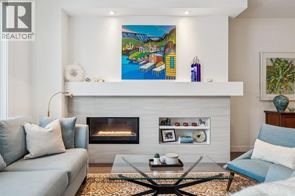 2924 15 Street Sw, Calgary, AB - Indoor Photo Showing Living Room With Fireplace
