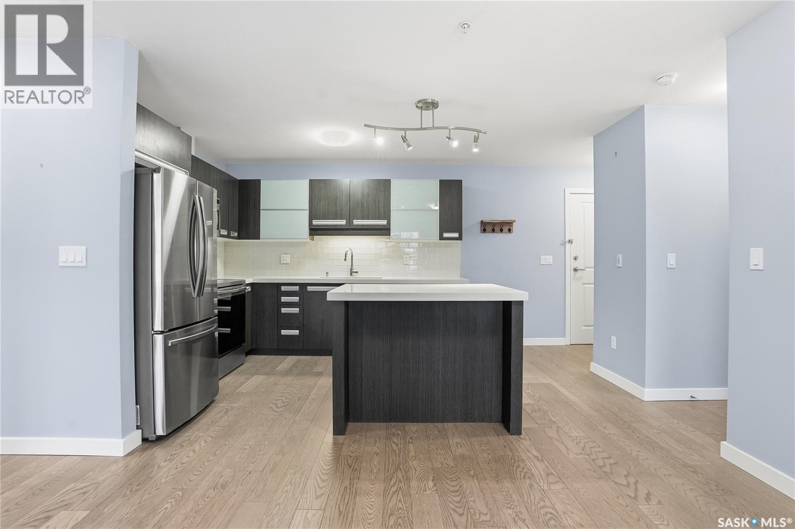 106 211 Ledingham Street, Saskatoon, SK - Indoor Photo Showing Kitchen With Stainless Steel Kitchen