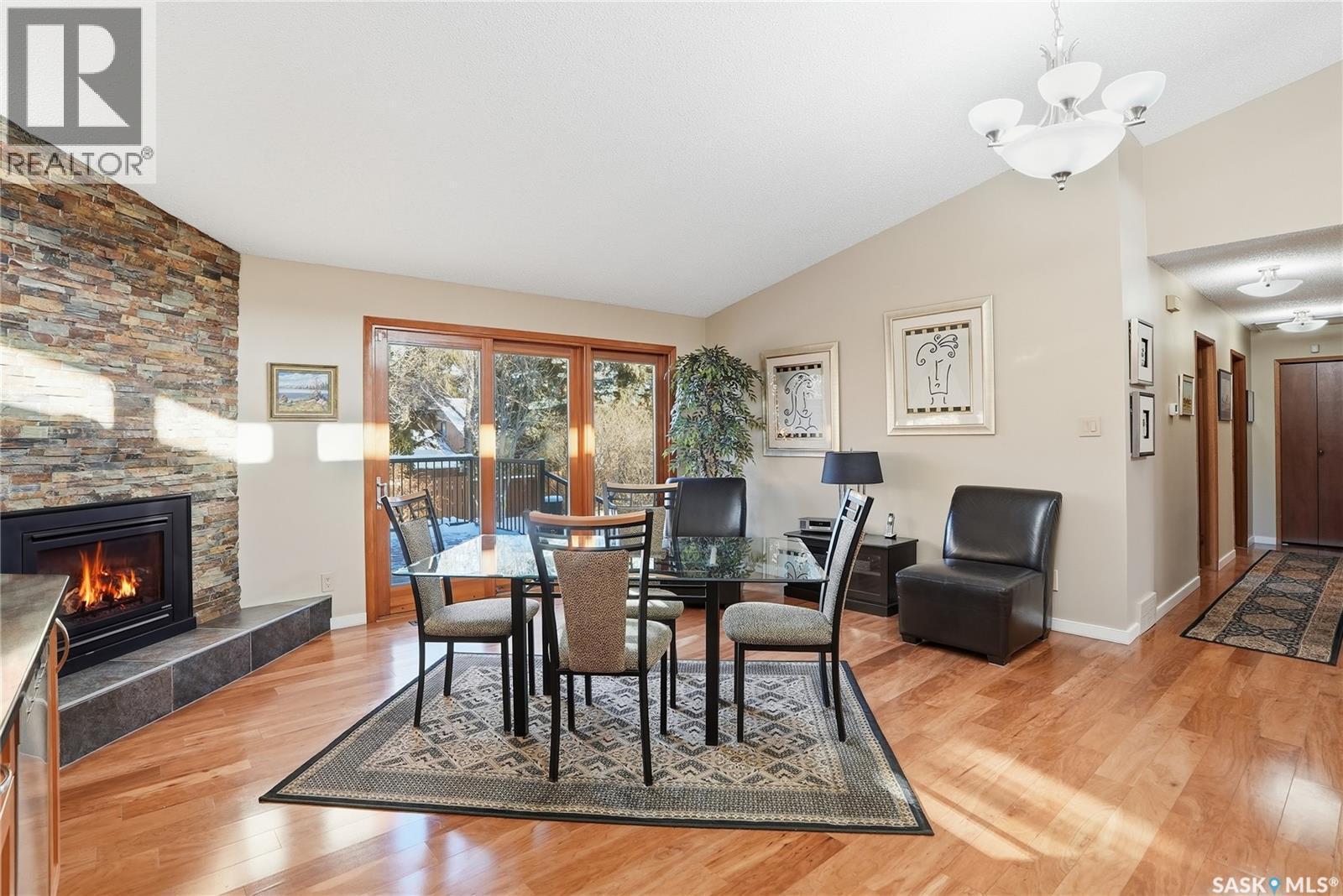 346 Sylvian Crescent, Saskatoon, SK - Indoor Photo Showing Dining Room With Fireplace