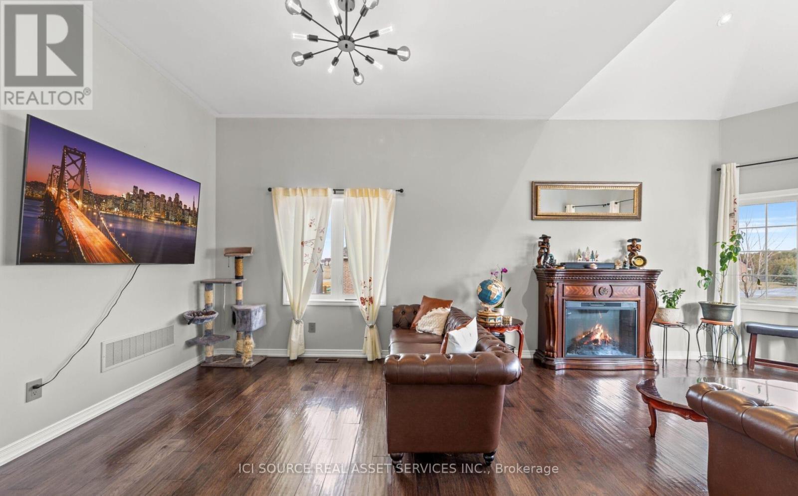 50 Songbird Crescent, Kawartha Lakes, ON - Indoor Photo Showing Living Room With Fireplace