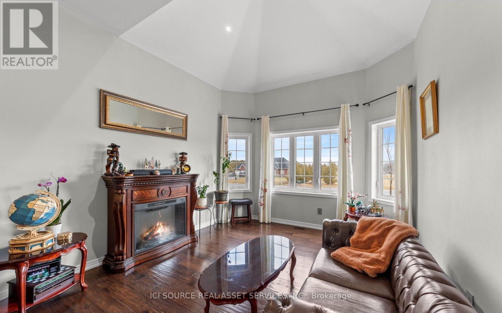 50 Songbird Crescent, Kawartha Lakes, ON - Indoor Photo Showing Living Room With Fireplace