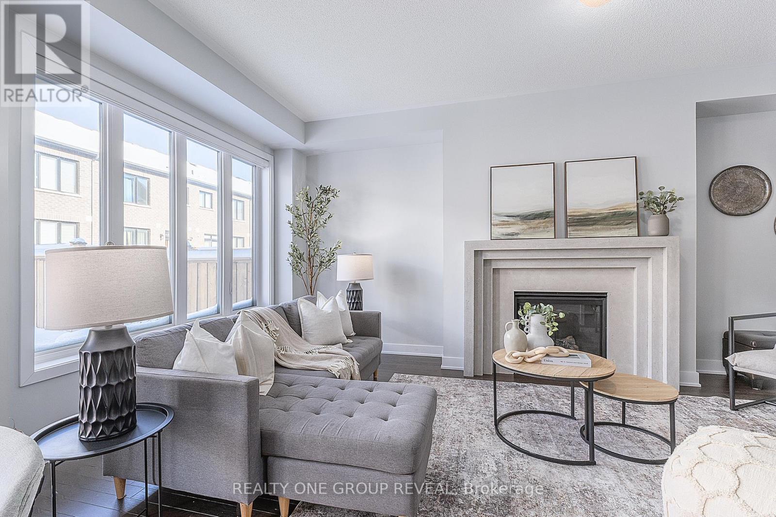 1044 Suddard Avenue, Oshawa, ON - Indoor Photo Showing Living Room With Fireplace