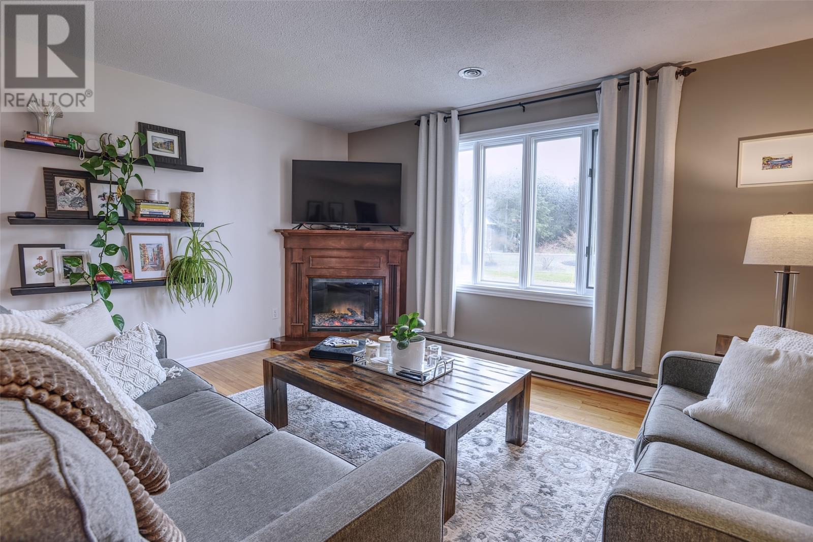 20 Mercers Road, Conception Bay South, NL - Indoor Photo Showing Living Room With Fireplace