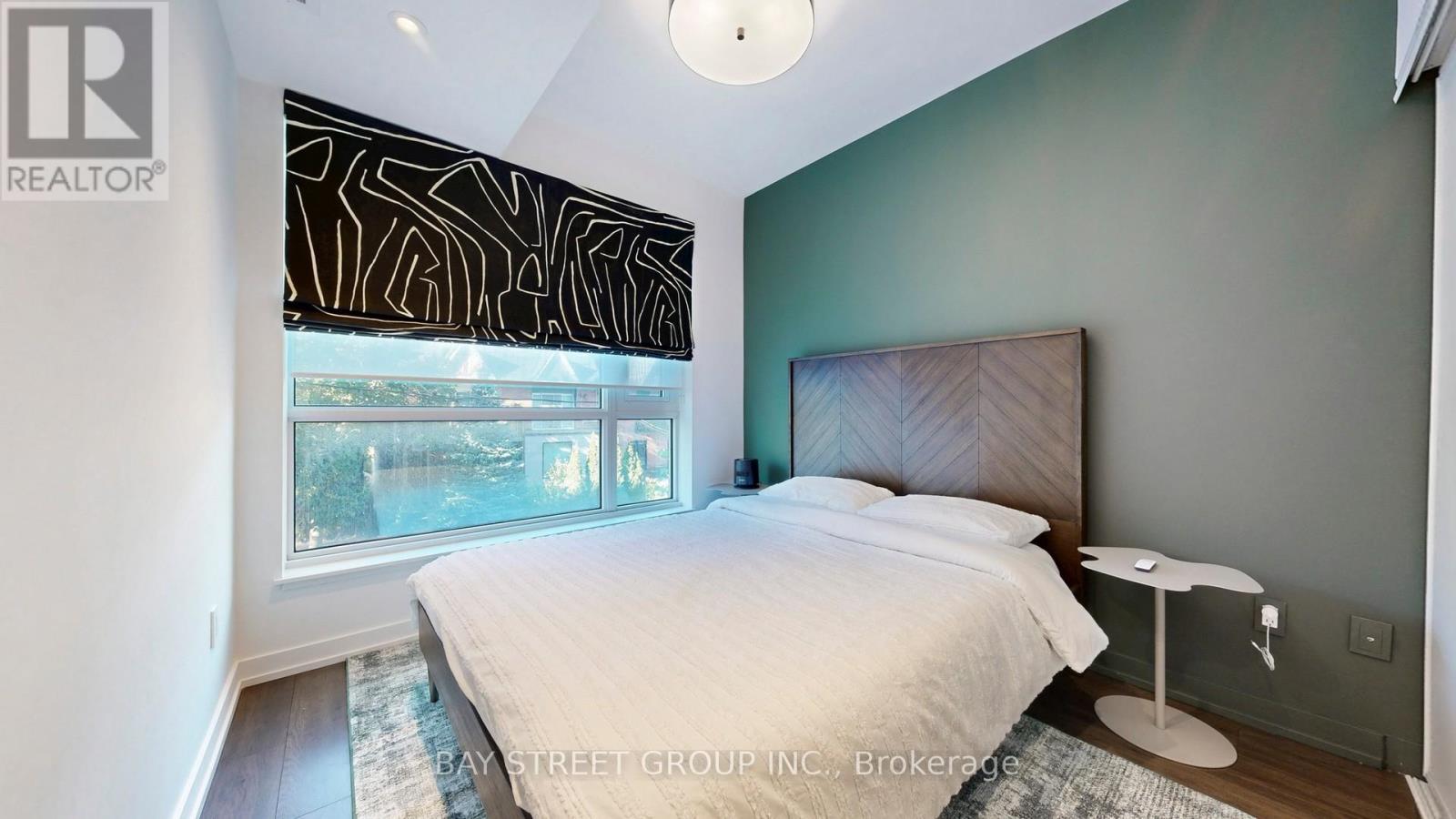 105 - 150 Logan Avenue W, Toronto, ON - Indoor Photo Showing Bedroom