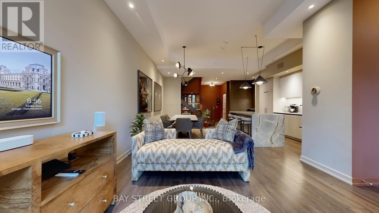105 - 150 Logan Avenue W, Toronto, ON - Indoor Photo Showing Living Room