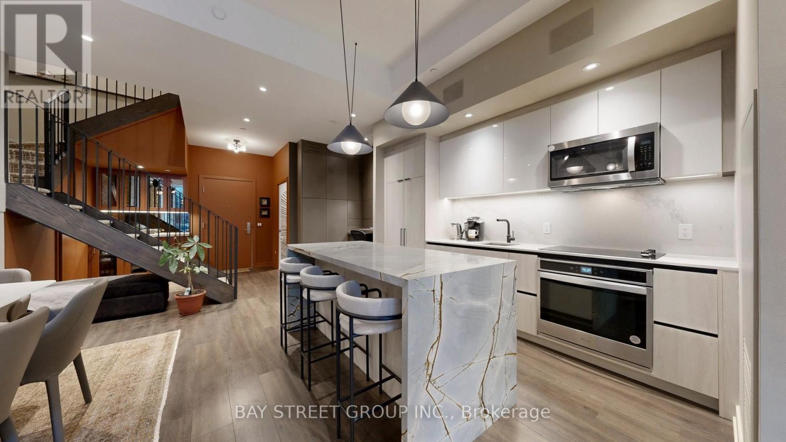 105 - 150 Logan Avenue W, Toronto, ON - Indoor Photo Showing Kitchen With Upgraded Kitchen